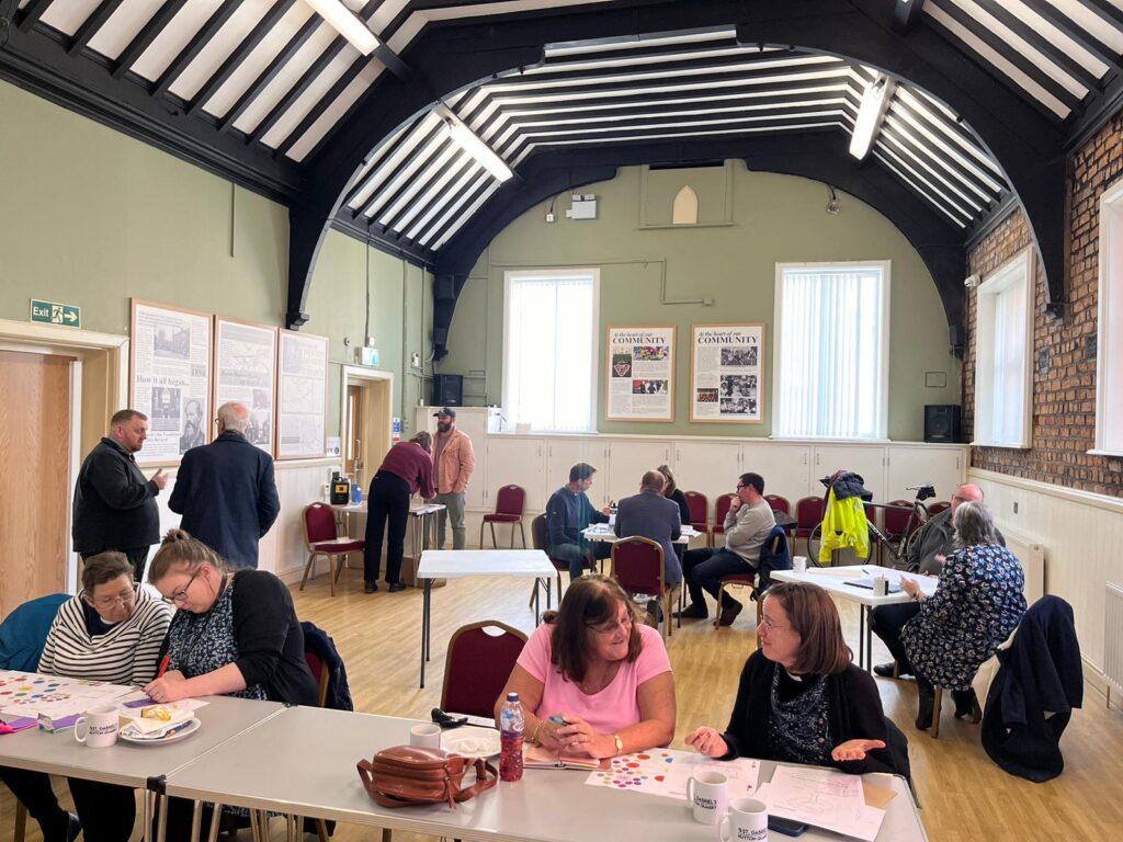 Photo shows attendees at a Learning Community session in Huyton