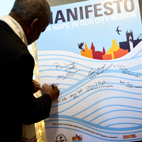 The Manifesto for Hope being signed by guests at the launch event